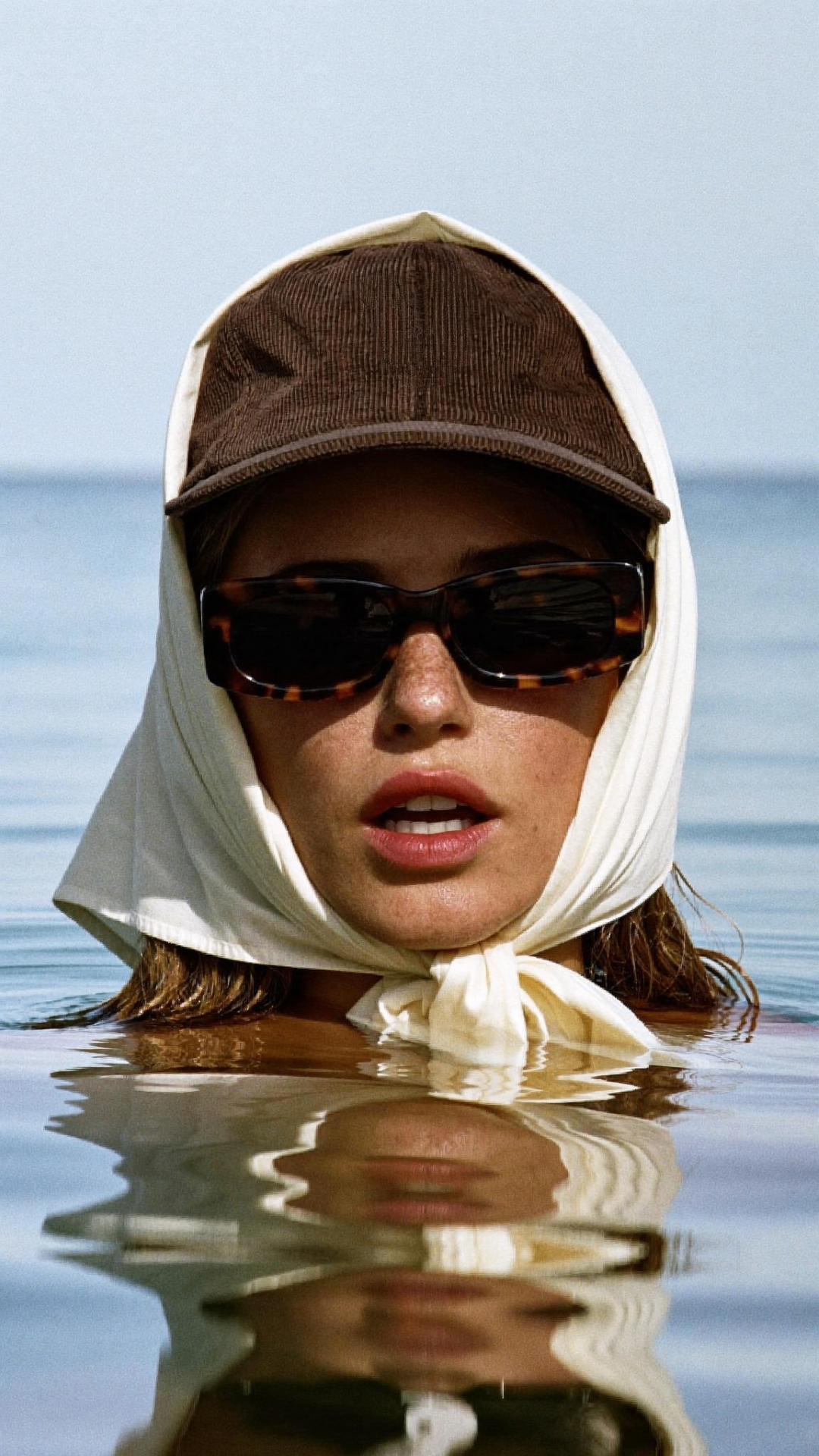 Original Prompt House library shot — editorial eyewear on water